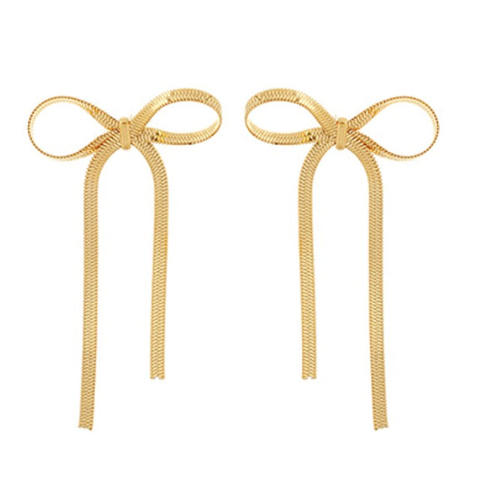 Everly Davis gold stainless steel bow drop earrings with delicate chain tails, 3 inches long.