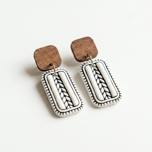 Everly Davis Jana earrings: handcrafted white clay rectangles with black inlay and wood tops. Geometric, lightweight statement earrings.