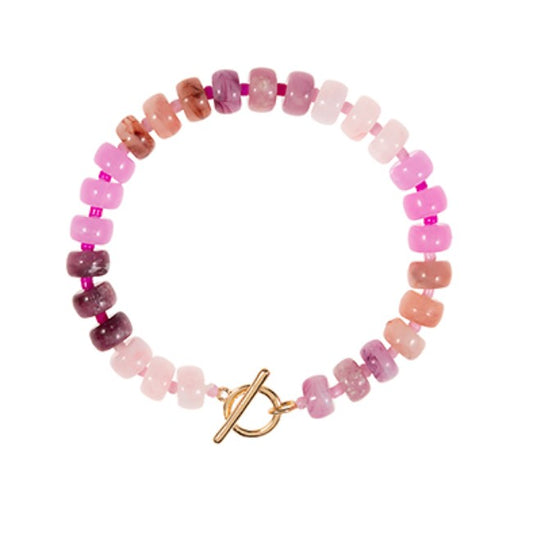 Everly Davis flat bead ombre bracelet in pink and purple resin with gold toggle clasp.