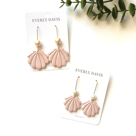 Everly Davis pink shell clay earrings with pearl accents. Hypoallergenic and lightweight.