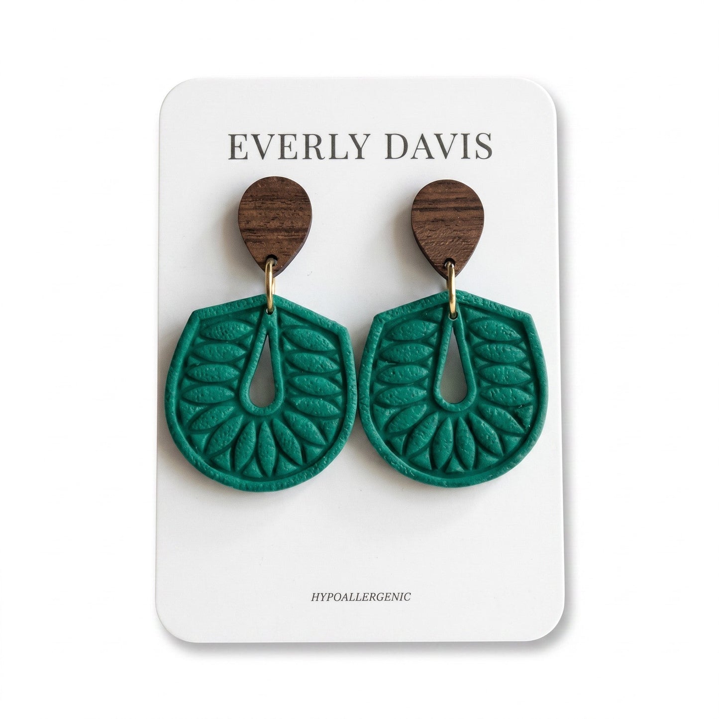 Everly Davis teal embossed teardrop dangle earrings with wood accent. Hypoallergenic.
