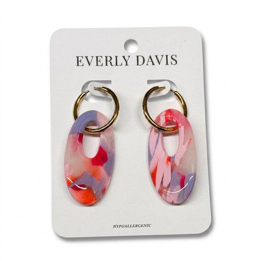 Everly Davis abstract resin hoop earrings in pink, purple, and orange marbled design with gold-tone hoops.
