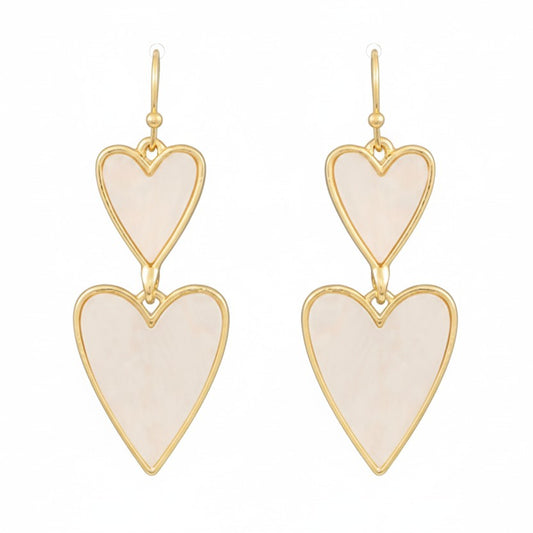 Everly Davis white acrylic shell heart drop earrings with gold-tone metal frames and fish hook closures.