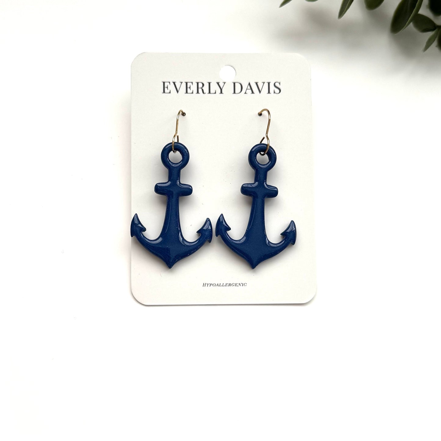 Everly Davis navy blue anchor dangle earrings with hypoallergenic ear wires.
