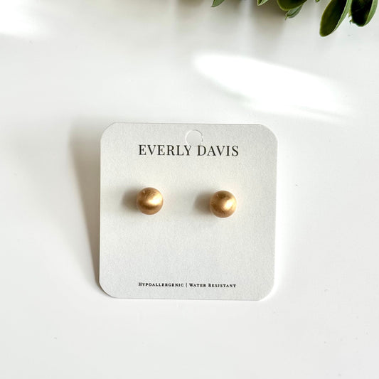 Everly Davis brushed gold ball stud earrings with a matte finish. Hypoallergenic and water-resistant.