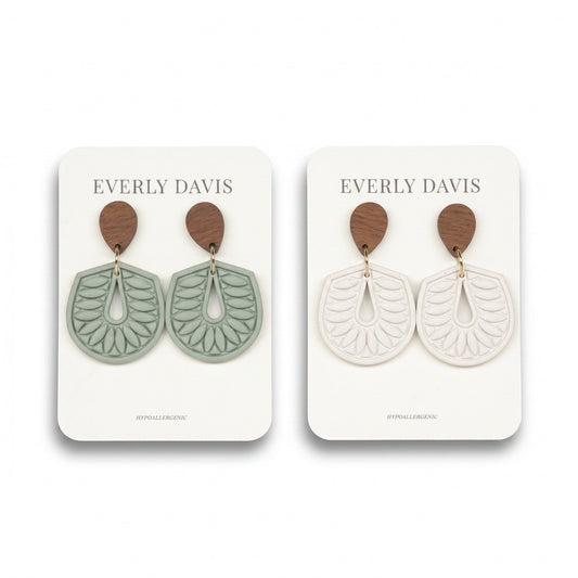 Everly Davis Embossed Teardrop Dangle Earrings in sage green and off-white with wood accents. Hypoallergenic.