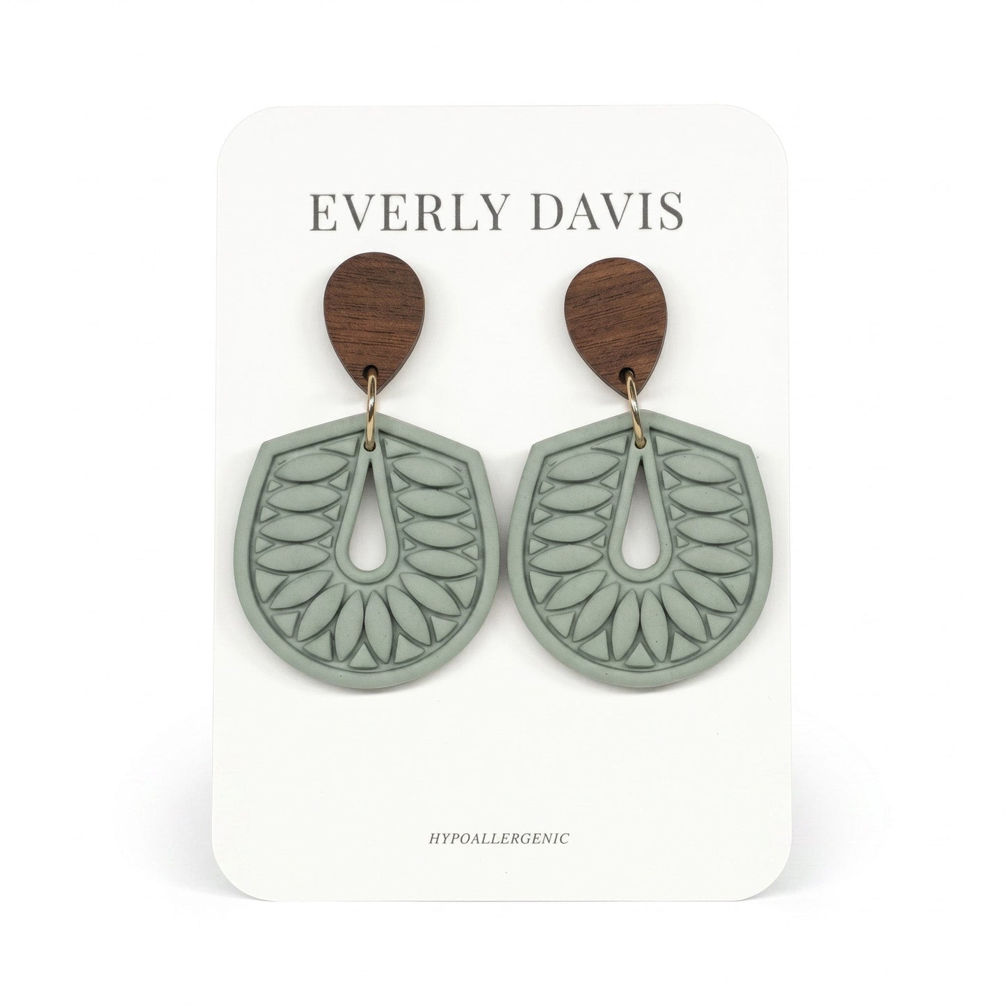 Everly Davis sage green embossed teardrop dangle earrings with wood accent. Hypoallergenic.