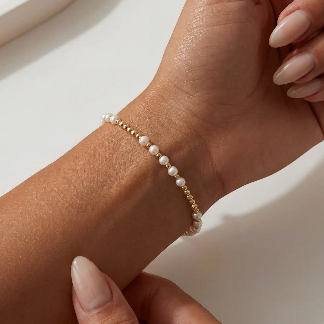 Everly Davis Emma Pearl Beaded Bracelet with 3mm gold-filled beads and pearls on stretch cord.