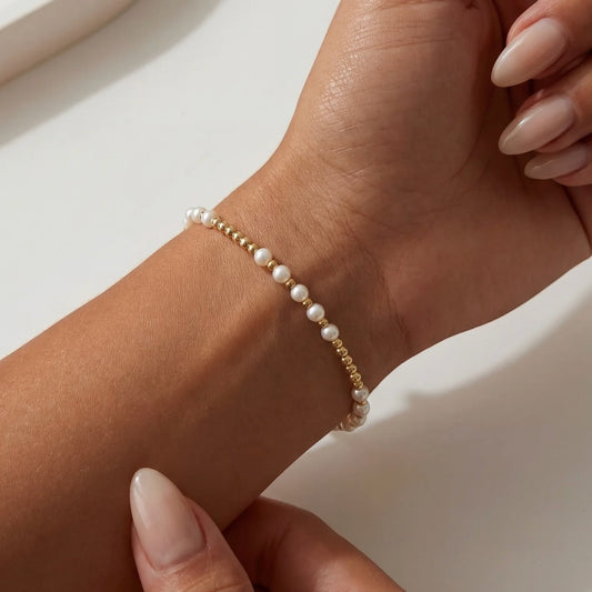 Everly Davis Emma Pearl Beaded Bracelet with 3mm gold-filled beads and pearls on stretch cord.