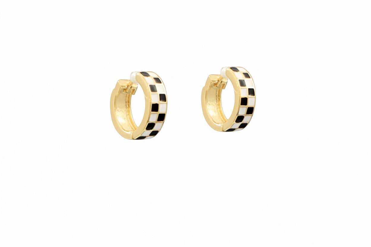 Everly Davis gold-tone hoop earrings with black and white enamel grid pattern. Medium size with secure clasp.