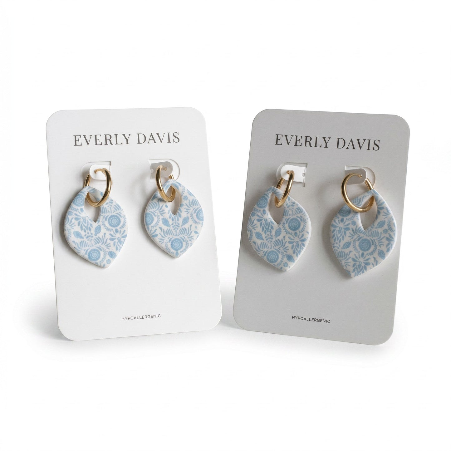 Everly Davis blue and white floral drop earrings with gold hoops. Hypoallergenic and water-resistant.