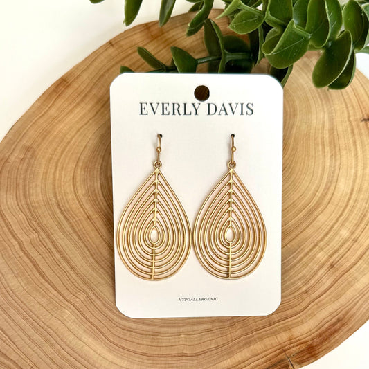 Everly Davis gold wire leaf shaped teardrop earrings with a delicate, open design. Hypoallergenic.