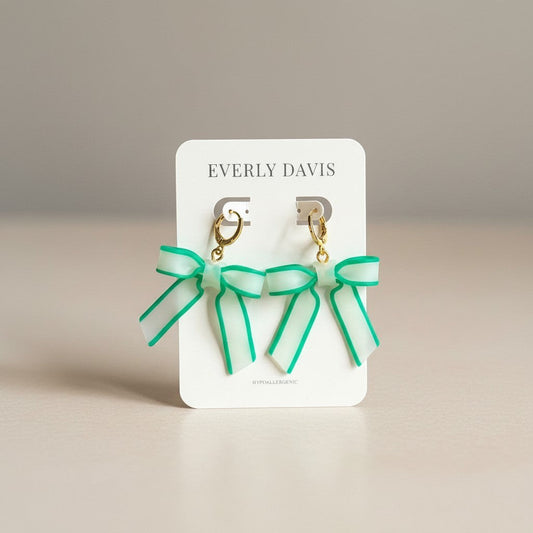Everly Davis sheer mint green bow dangle earrings with emerald green trim and gold-tone leverback clasps.