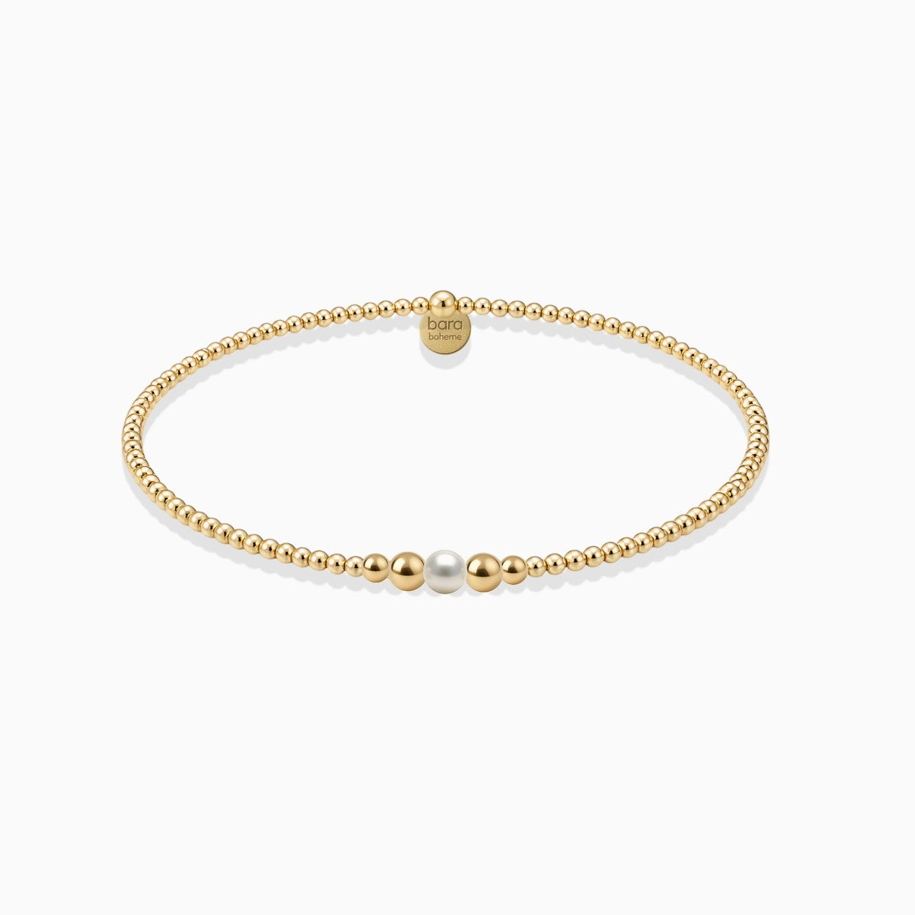 Everly Davis Jenna Pearl Beaded Bracelet, gold filled, minimalist, stackable, stretch cord, 2mm-4mm beads, single pearl accent.