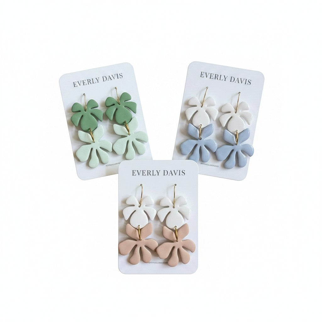 Everly Davis Leah leaf motif earrings in pastel green, white, blue, and blush clay. Lightweight and elegant.