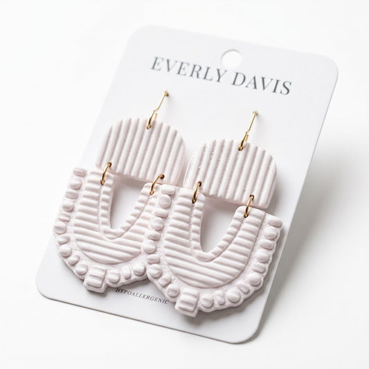 Everly Davis light pink clay earrings with ribbed and beaded texture, hypoallergenic and lightweight for everyday wear.