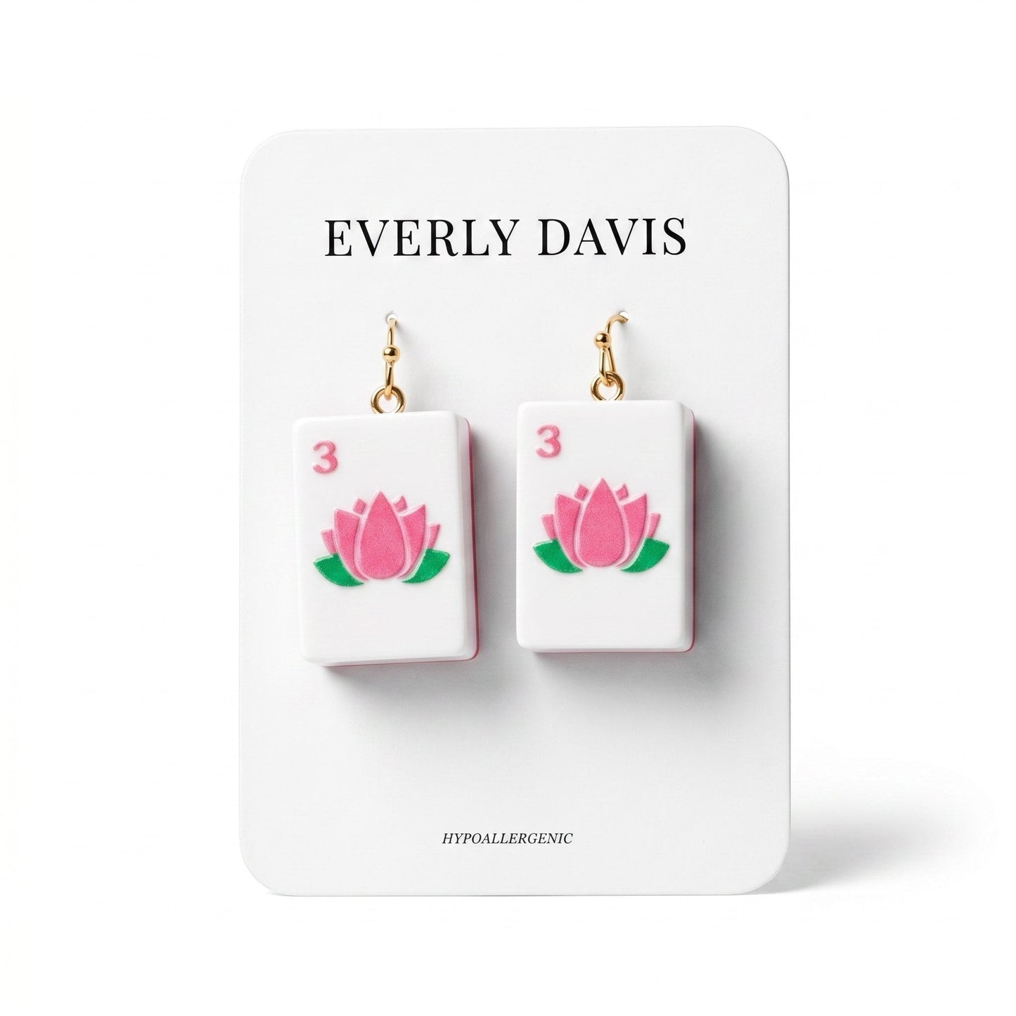 Everly Davis white acrylic Mahjong tile drop earrings with pink lotus and green leaves, gold-tone hooks.