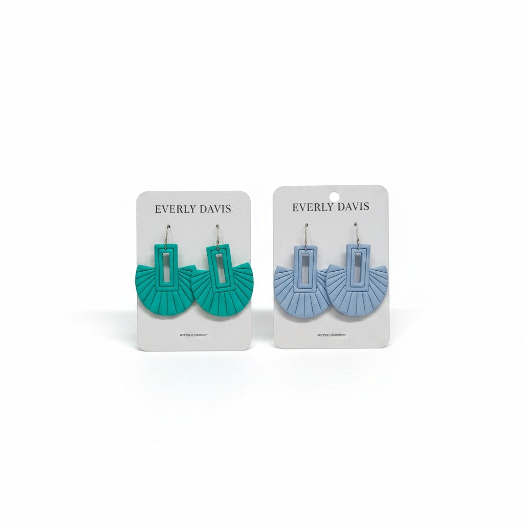 Everly Davis Myra earrings in teal and light blue. Handcrafted clay fan-shaped earrings with artisan details.