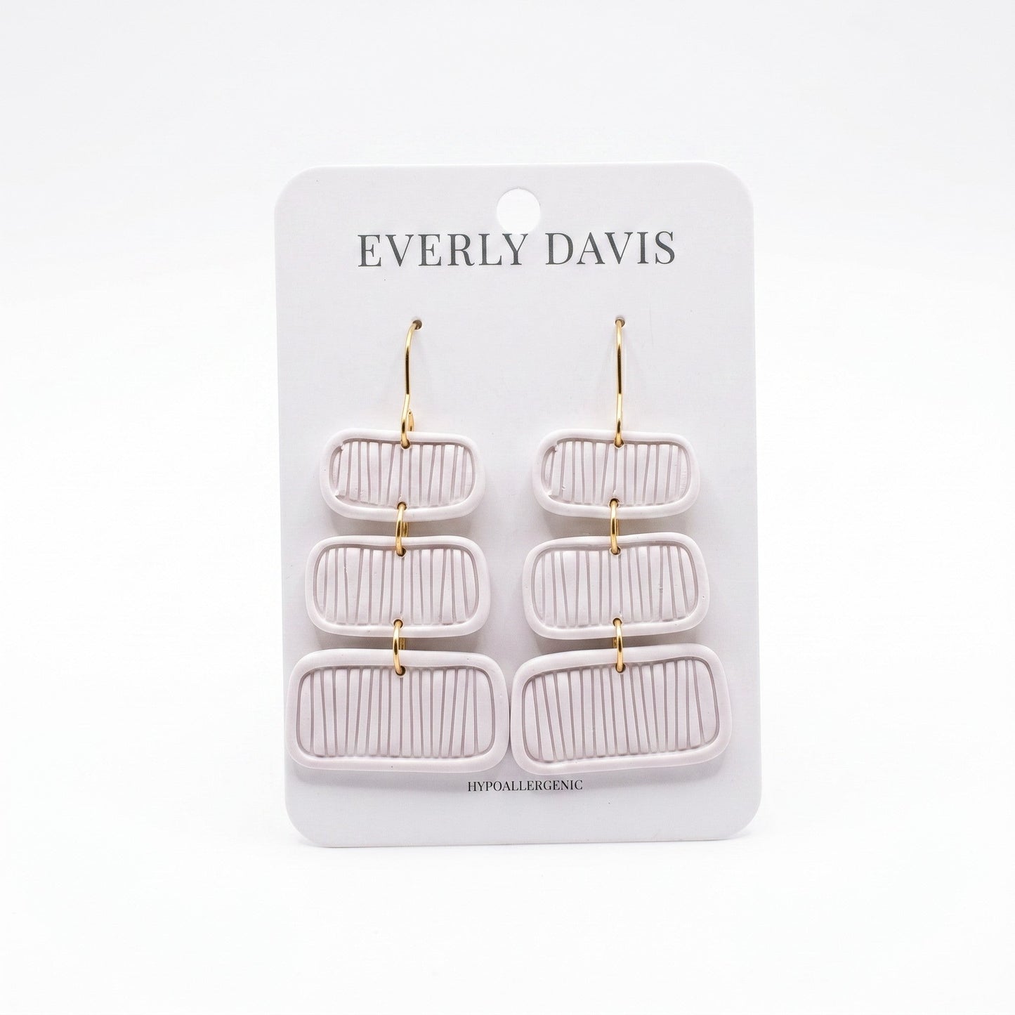 Everly Davis Pammi light purple clay dangle earrings with a ribbed texture and modern design.
