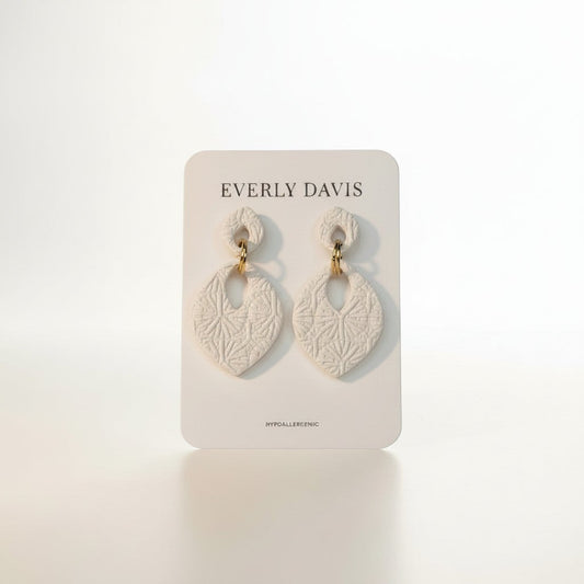 Everly Davis Venni Drops teardrop clay earrings with embossed geometric pattern, off-white color.