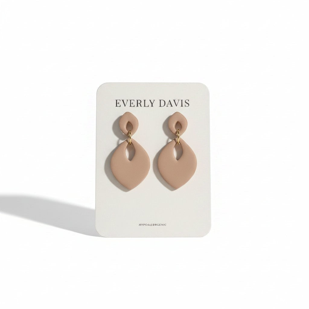 Everly Davis Venni Drops teardrop clay earrings in a neutral beige hue. Lightweight and hypoallergenic.