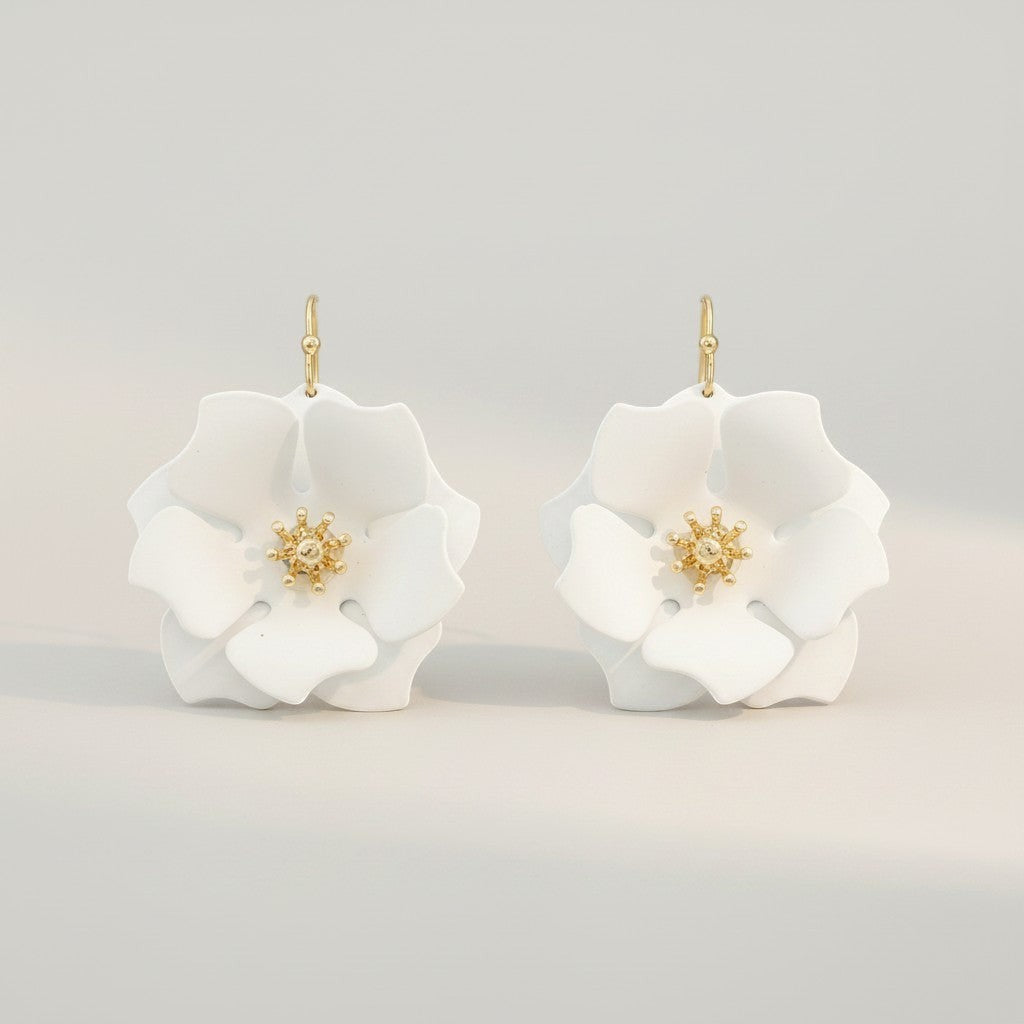 Everly Davis white flower earrings with gold center and fish hook closure, 1.5" length.