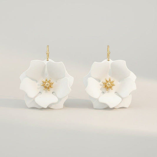 Everly Davis white flower earrings with gold center and fish hook closure, 1.5" length.