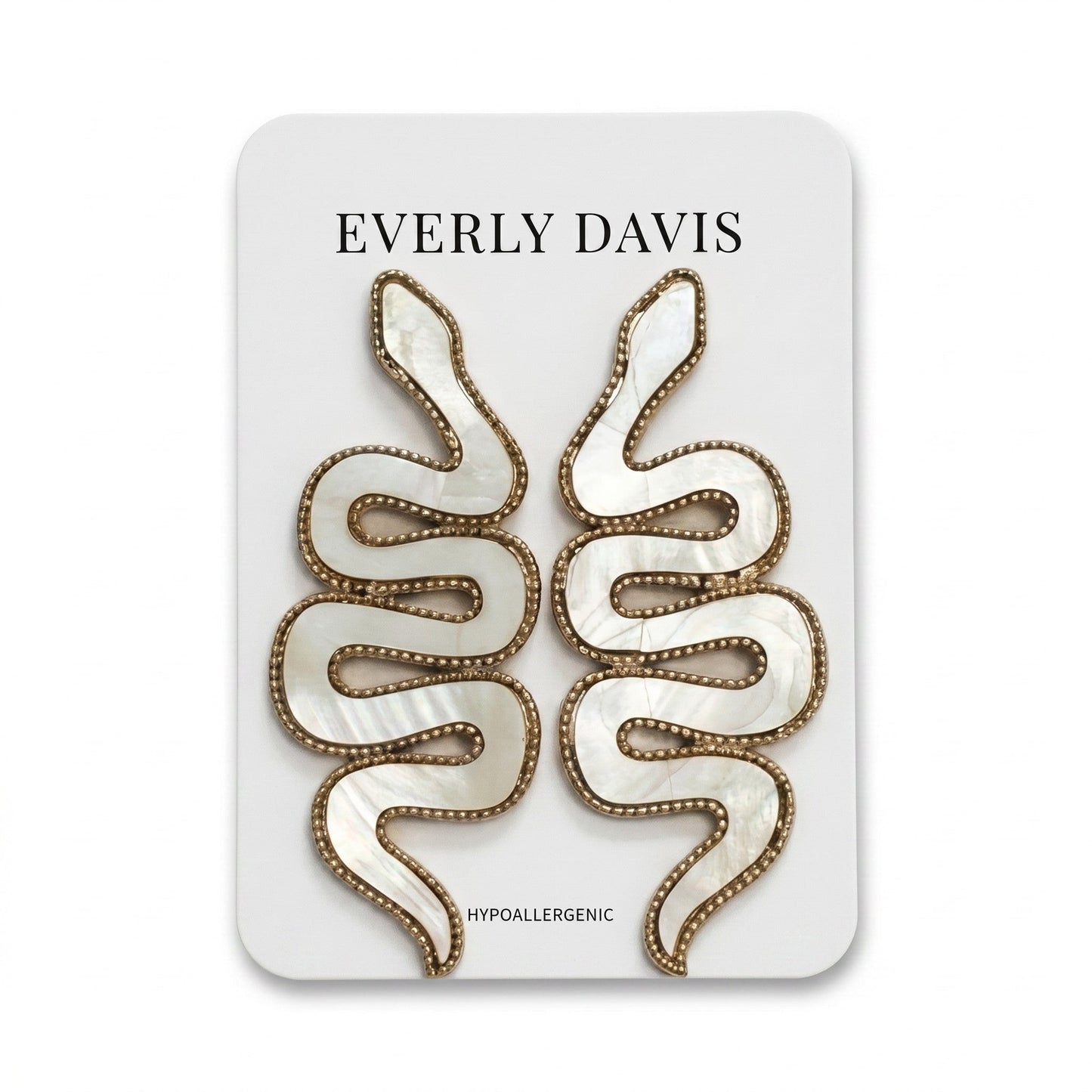 Everly Davis white shell and metal snake earrings with gold trim and post backing. Hypoallergenic.
