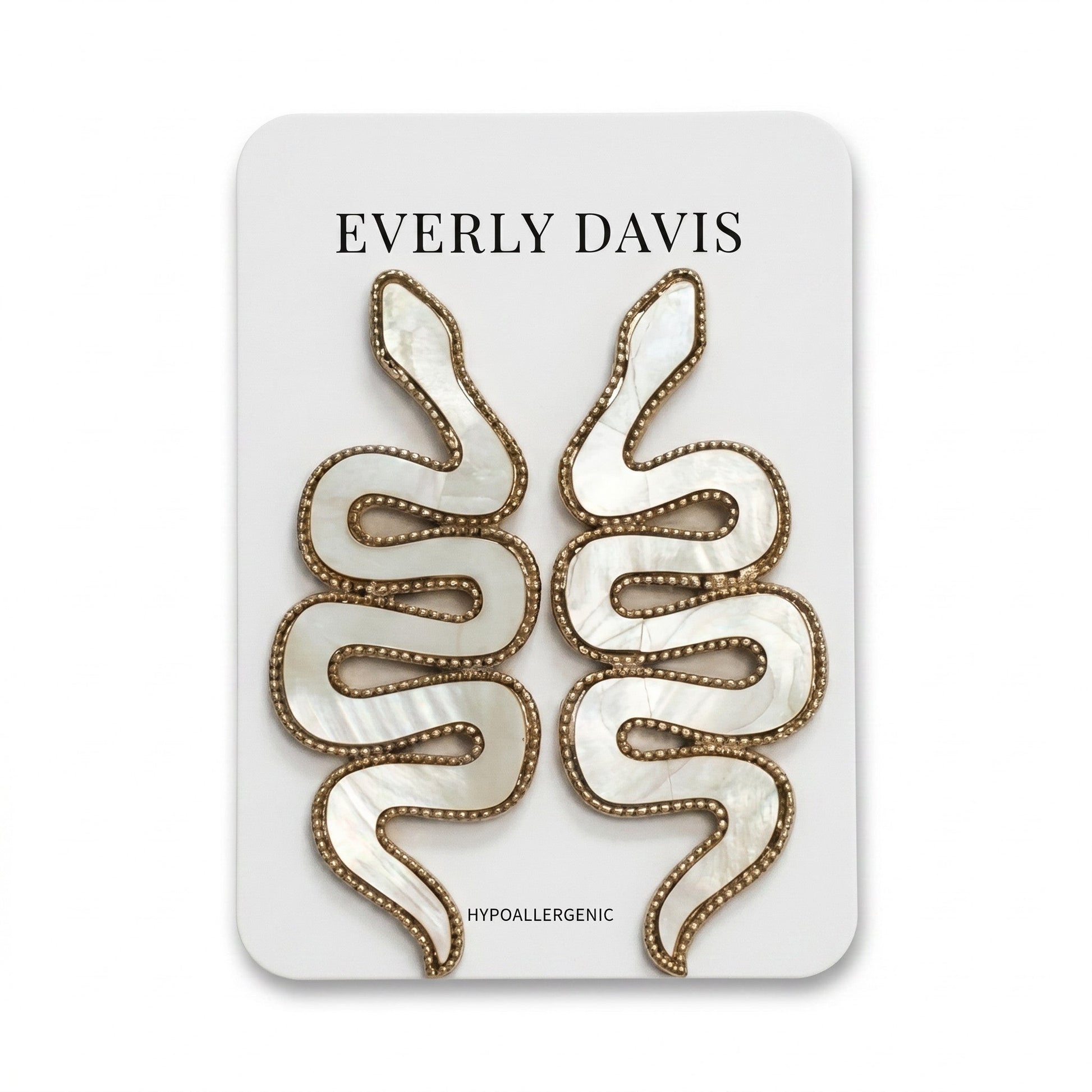 Everly Davis white shell and metal snake earrings with gold trim and post backing. Hypoallergenic.