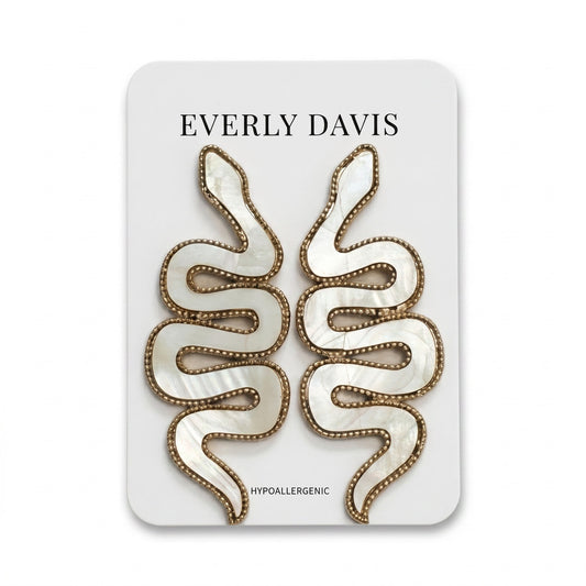Everly Davis white shell and metal snake earrings with gold trim and post backing. Hypoallergenic.